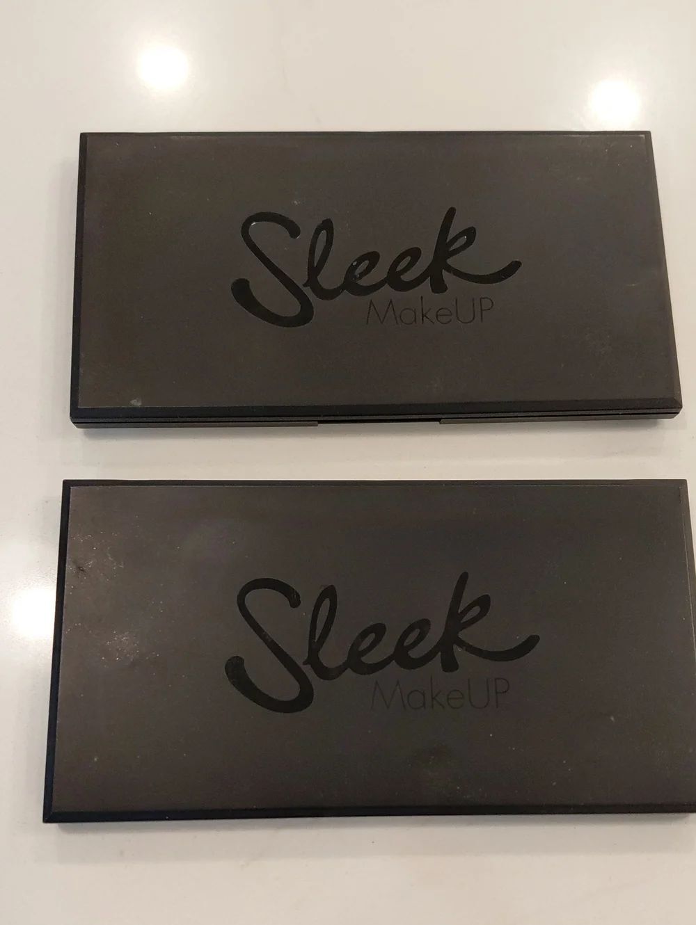 Two Sleek Makeup Eyeshadow Palettes— Classic Black Finish With Perfect Colors.